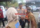 Kapolres Luwu Utara Bersama Bupati Luwu Utara Tinjau Lokasi Banjir dan Bagikan Bantuan Sosial